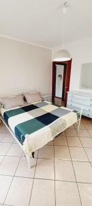 Postel nebo postele na pokoji v ubytování Casa di Minù