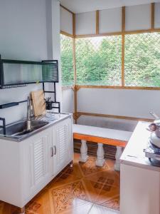 Η κουζίνα ή μικρή κουζίνα στο Burni Houses +13 φωτογραφίες