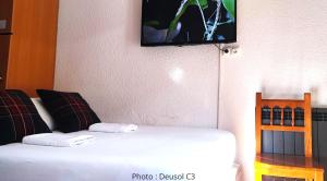 Postel nebo postele na pokoji v ubytování AC Apartaments Vall d'Incles + 6 fotografií