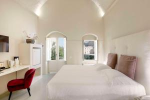 Voodi või voodid majutusasutuse Sant'Angelo, Matera - Small Luxury Hotels toas