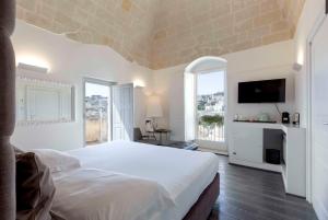 Voodi või voodid majutusasutuse Sant'Angelo, Matera - Small Luxury Hotels toas