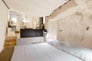 Voodi või voodid majutusasutuse Sant'Angelo, Matera - Small Luxury Hotels toas
