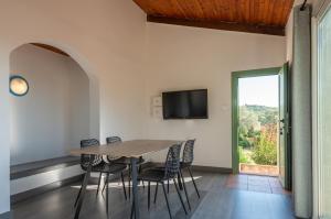 Μια τηλεόραση ή/και κέντρο ψυχαγωγίας στο Résidence Domaine De Caranella