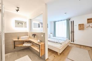 Postel nebo postele na pokoji v ubytování Gästehaus Zeitraum