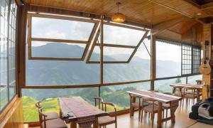 Fotografie z fotogalerie ubytování 龙脊梯田希悦山宿七星伴月观景台店 v destinaci Heping