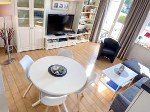 TV a/nebo společenská místnost v ubytování Wohnpark Stadt Hamburg - Apt. 50