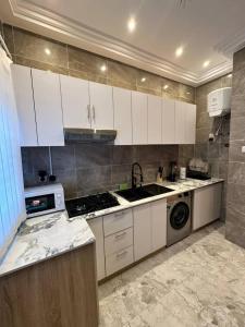 Η κουζίνα ή μικρή κουζίνα στο Luxe appart