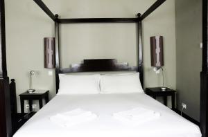 Letto o letti in una camera di Casa Colonial
