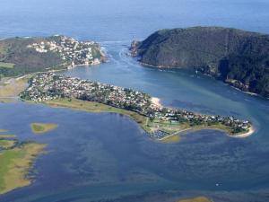 an aerial view of an island in the water at Isola Bella Guest House in Knysna