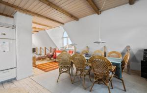a dining room with a table and chairs at 2 Bedroom Nice Apartment In Ribe in Ribe