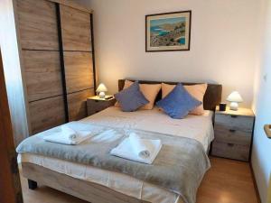 Postel nebo postele na pokoji v ubytování Apartments PoolHouse + 43 fotografií