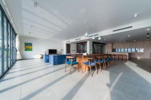 a dining room with a table and chairs at Anh Nguyen Oceanfront Luxury Villas Nha Trang in Nha Trang +214 photos