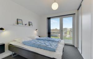 Letto o letti in una camera di 4 Bedroom Beautiful Home In Haderslev
