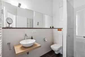 Koupelna v ubytování limehome Leipzig Am Brühl + 33 fotografií