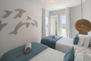 Ένα ή περισσότερα κρεβάτια σε δωμάτιο στο MUPA Apartments