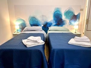 Ένα ή περισσότερα κρεβάτια σε δωμάτιο στο Magnolia Apartments