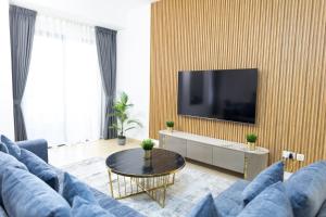 TV a/nebo společenská místnost v ubytování JBR apartments by HAPPY SEASON