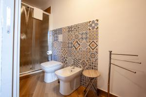 Koupelna v ubytování Pasitea Rooms