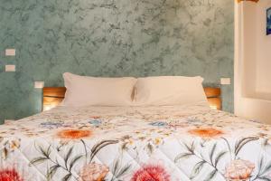 Postel nebo postele na pokoji v ubytování Pasitea Rooms