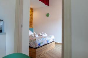 Postel nebo postele na pokoji v ubytování Pasitea Rooms