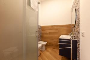 Koupelna v ubytování Pasitea Rooms