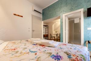 Postel nebo postele na pokoji v ubytování Pasitea Rooms