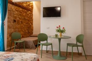 TV a/nebo společenská místnost v ubytování Pasitea Rooms
