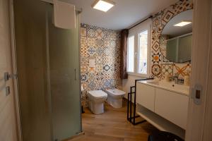Koupelna v ubytování Pasitea Rooms