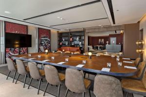 A television and/or entertainment centre at Radisson RED Danang
