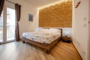Postel nebo postele na pokoji v ubytování Pasitea Rooms