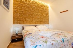 Postel nebo postele na pokoji v ubytování Pasitea Rooms