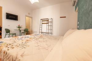 Postel nebo postele na pokoji v ubytování Pasitea Rooms