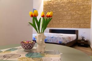 Postel nebo postele na pokoji v ubytování Pasitea Rooms
