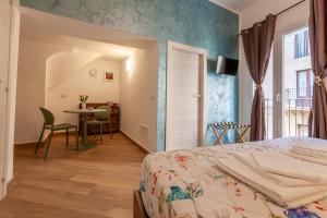 Postel nebo postele na pokoji v ubytování Pasitea Rooms