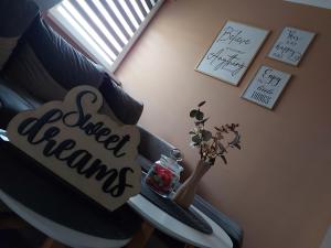 Ruang duduk di Apartman Sweet Dreams