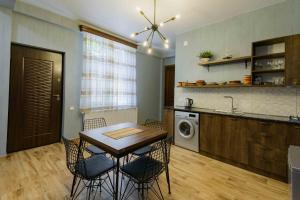 Kuchyň nebo kuchyňský kout v ubytování Urban Villa By Umbrella