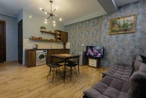 TV a/nebo společenská místnost v ubytování Urban Villa By Umbrella