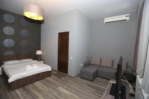 Postel nebo postele na pokoji v ubytování Urban Villa By Umbrella