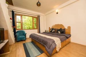 Rúm í herbergi á Hippie Panda Hostel