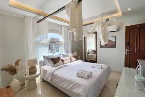 เตียงในห้องที่ Cleopatra Pyramids Elite +4 ภาพ