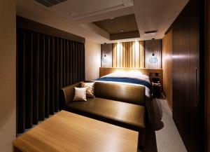 A bed or beds in a room at N Hotel