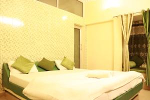 Shiv Shakti Hostel客房内的一张或多张床位