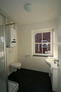 Et badeværelse på Feriendorf Robbenplatte Burhave 2