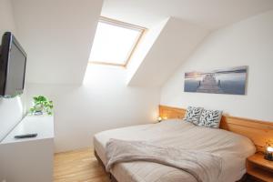 Posteľ alebo postele v izbe v ubytovaní Appartements Stranach