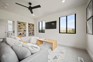 a living room with a couch and a table at Alpine Adventure Pt C201 Wolf Creek Golf Course in Mountain View Estates