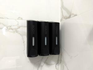 two black vases sitting on top of a counter at Studio Plaza Faza 2 in Militari +8 photos