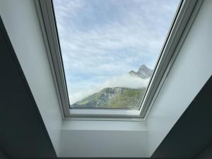 Nespecifikovaný výhled na hory nebo výhled na hory při pohledu z apartmánu