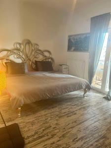 Postel nebo postele na pokoji v ubytování Flat in Makrygialos