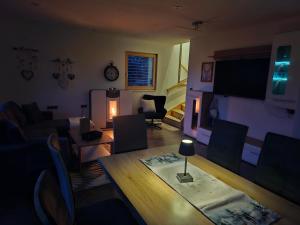 TV a/nebo společenská místnost v ubytování HET Lounge