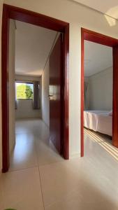 Ένα ή περισσότερα κρεβάτια σε δωμάτιο στο Residencial Paraíba Casa M E
